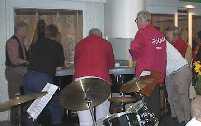 Samling runt pianot